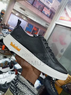 This Paire of Boos Sneakers in Amulticolord