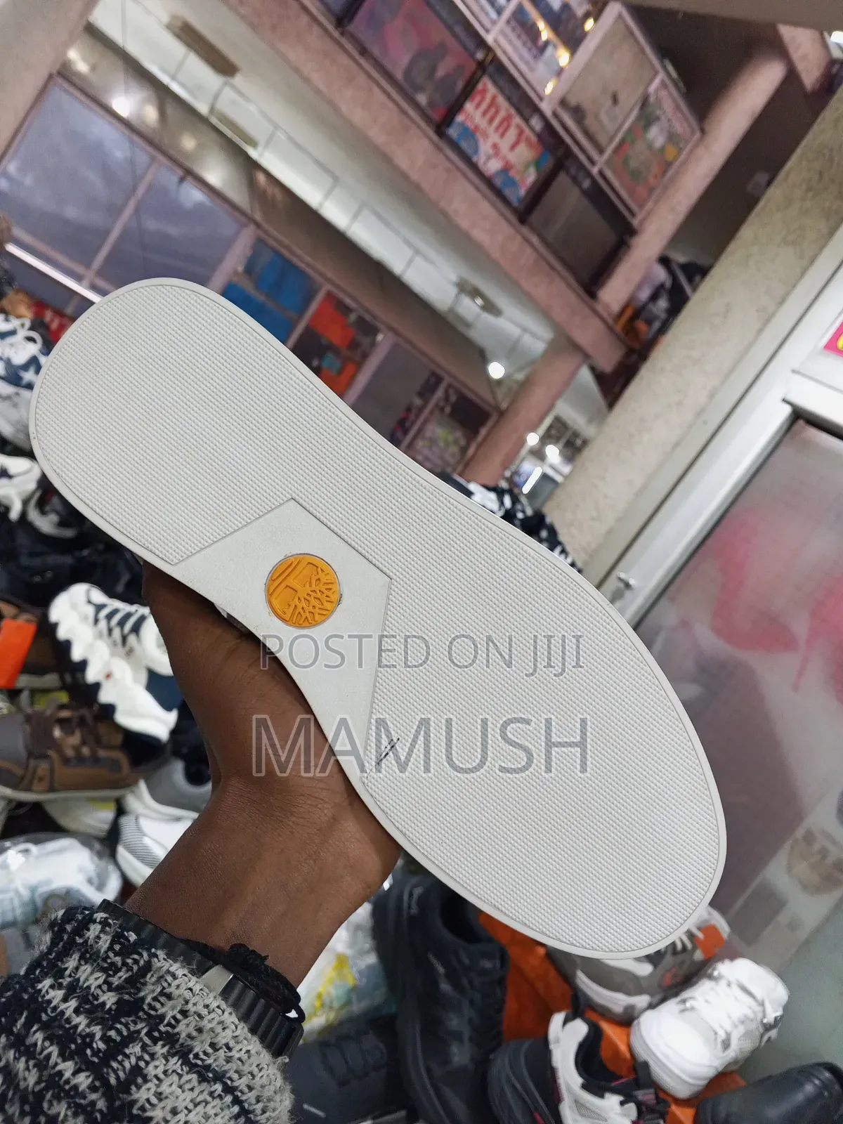 This Paire of Boos Sneakers in Amulticolord