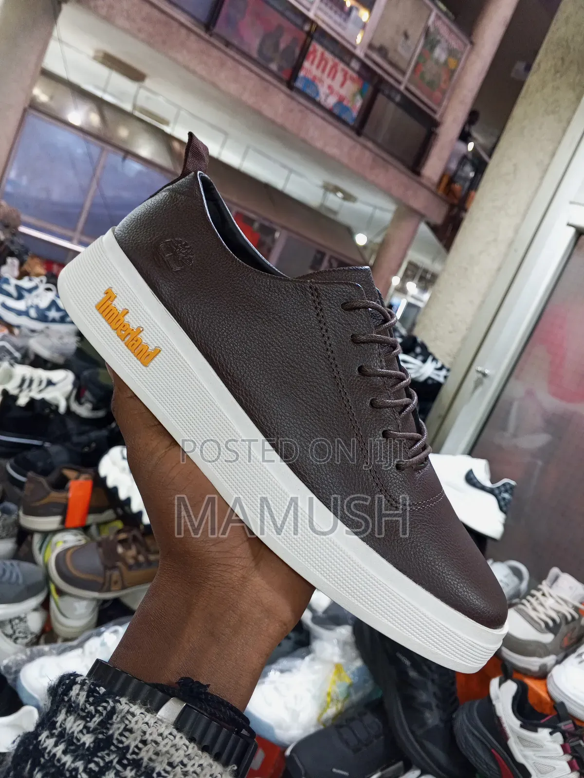 This Paire of Boos Sneakers in Amulticolord