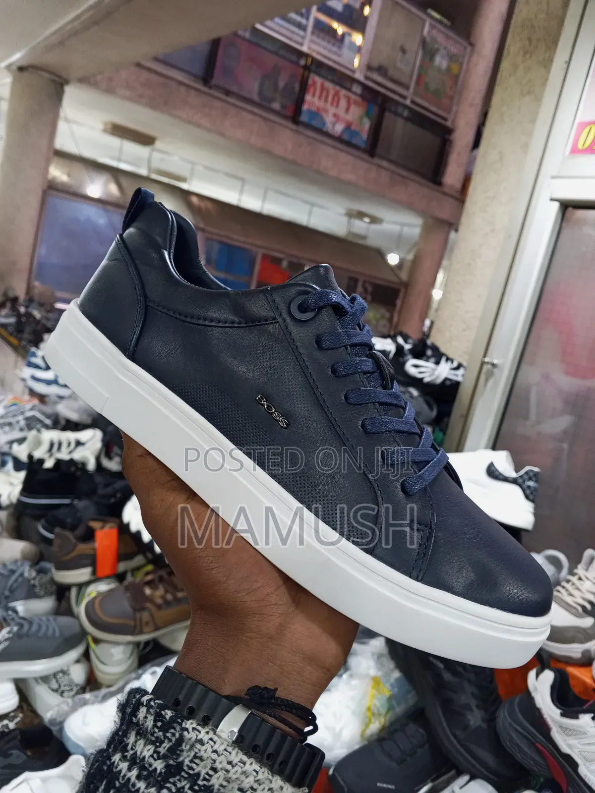 This Paire of Boos Sneakers in Amulticolord