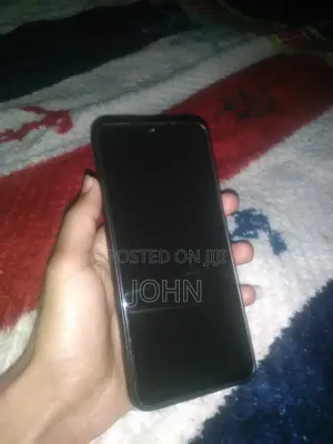 Photo - Samsung Galaxy A12 64 GB Red