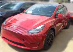 Photo - New Tesla Model Y 75D kWh Long Range AWD 2023 Red