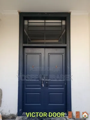 Photo - የአየሩን ሁኔታ የሚቋቋም ምርጥ ቀለም እና ጥራት Victor Door