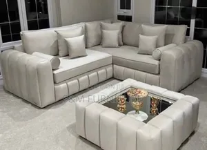 Showstopping L Shape Sofa With Table.