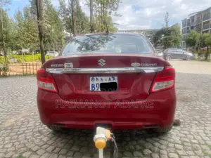 Photo - Suzuki Dzire 2021 Burgundy