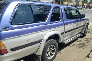 Photo - Mitsubishi L200 2003 Blue