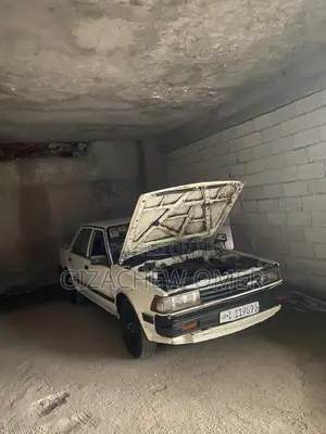 Photo - Nissan Bluebird 1990 White