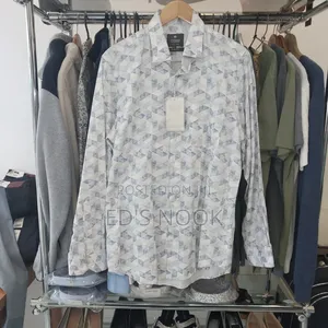 Photo - Men’S White Long-Sleeve Button-Up Shirt With Blue Triangular Pattern