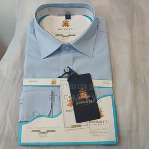 Photo - Men’S Light Blue Long-Sleeve Button-Up Shirt – Clean