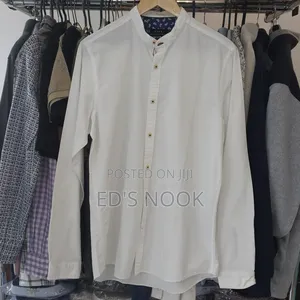 Photo - Men’S White Long-Sleeve Button-Up Shirt – Clean