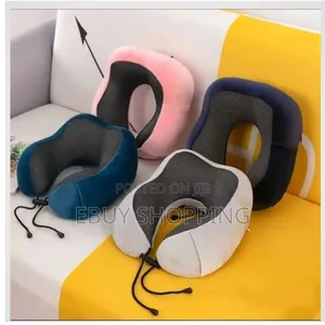 Photo - U-Shaped Orthopedic Neck Pillow for Pain Relief Better Sleep