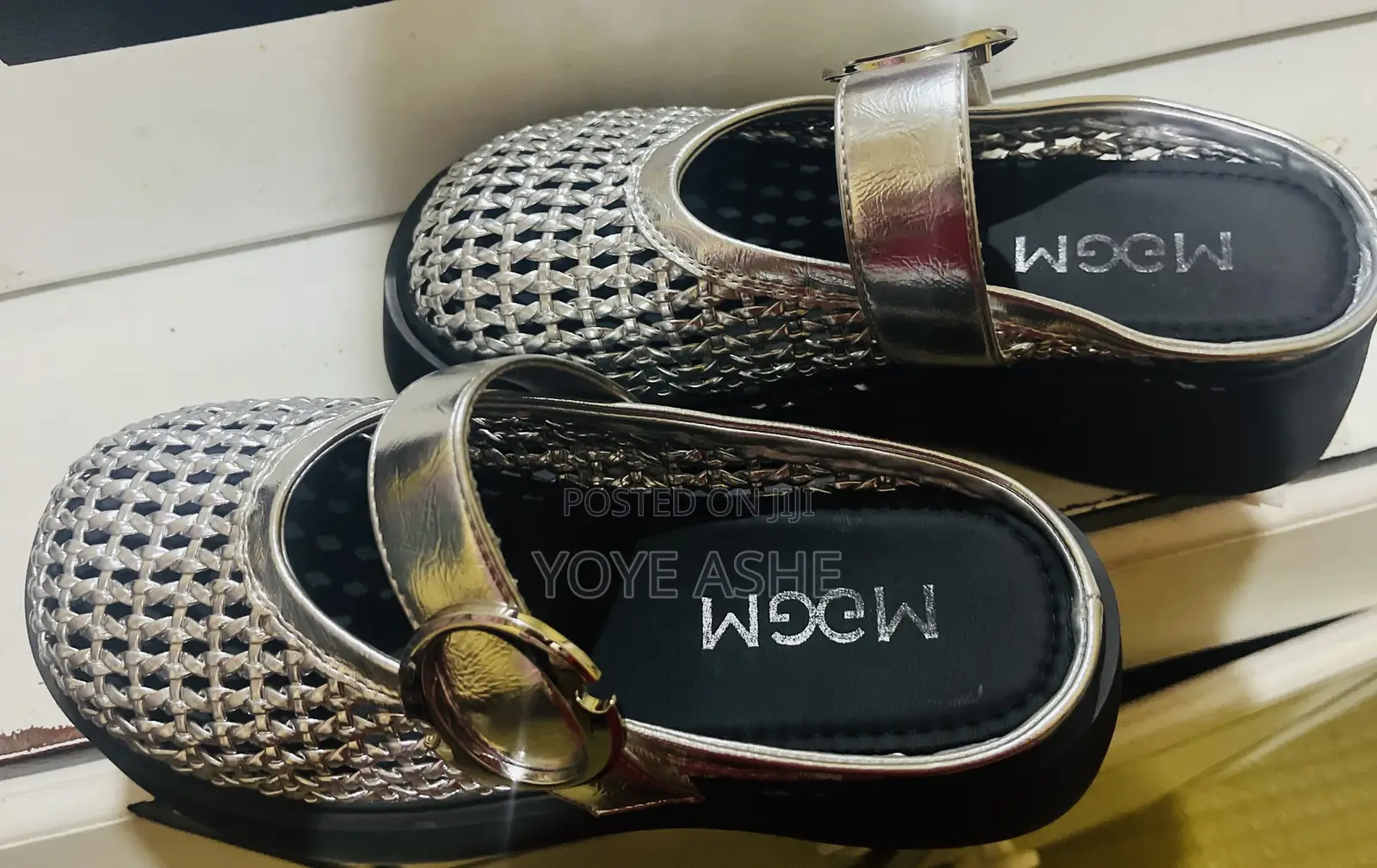 Sandals With a Buckle Strap, Possibly From the Brand Mogm