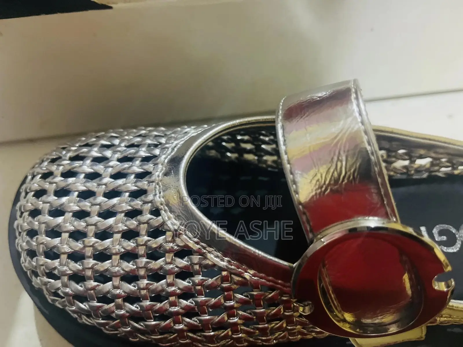 Sandals With a Buckle Strap, Possibly From the Brand Mogm