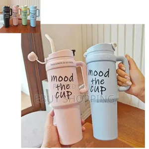 Photo - Hot Cold Lock Tumbler Featuring a Handle and Straw