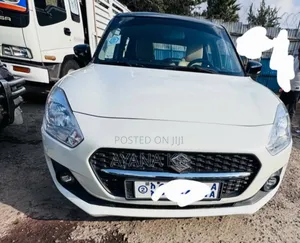 Photo - Suzuki Swift 2022 White