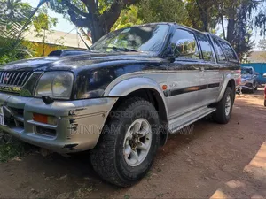 Photo - Mitsubishi L200 1998 Gray