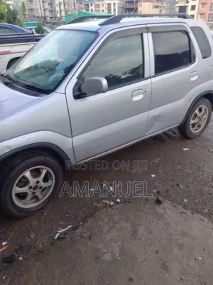 Photo - Suzuki Kei 2001 Silver