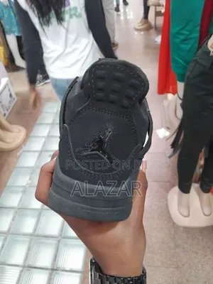 The Air Jordan 4 Retro "Black Cat