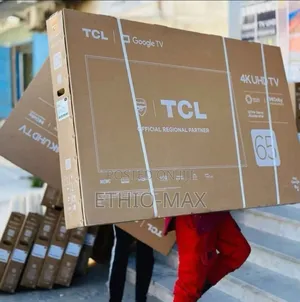 Photo - TCL Tv 65" Smart Android Qled Tv 4 K Uhd