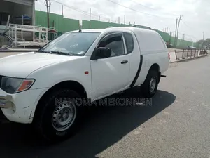 Mitsubishi L200 2009 White