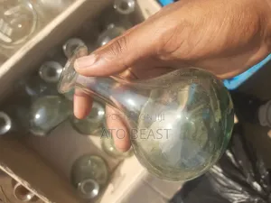 የጠጅ ብርሌ Hand-Blown Glass Bottle,Potentially a Vintage or Antique Piece