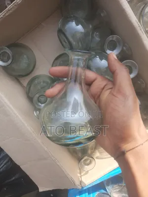 የጠጅ ብርሌ Hand-Blown Glass Bottle,Potentially a Vintage or Antique Piece