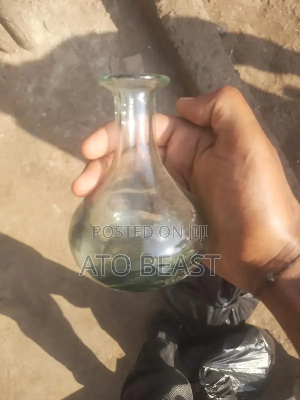 የጠጅ ብርሌ Hand-Blown Glass Bottle,Potentially a Vintage or Antique Piece