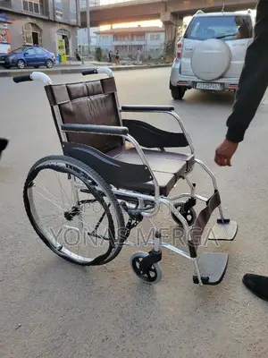 Commode (Toilet Wheelchair), and Can Be Used Over a Standard Toilet.