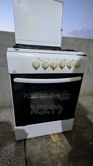 ባለ 3 Cylinder እና 1 Electric Stove ከነ Oven. Stove With Oven
