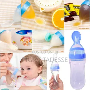 Baby Spoon Feeding Bottle ለአጥሚት አንደኛ