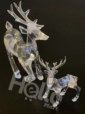 Two Clear Acrylic Reindeer Figurines.
