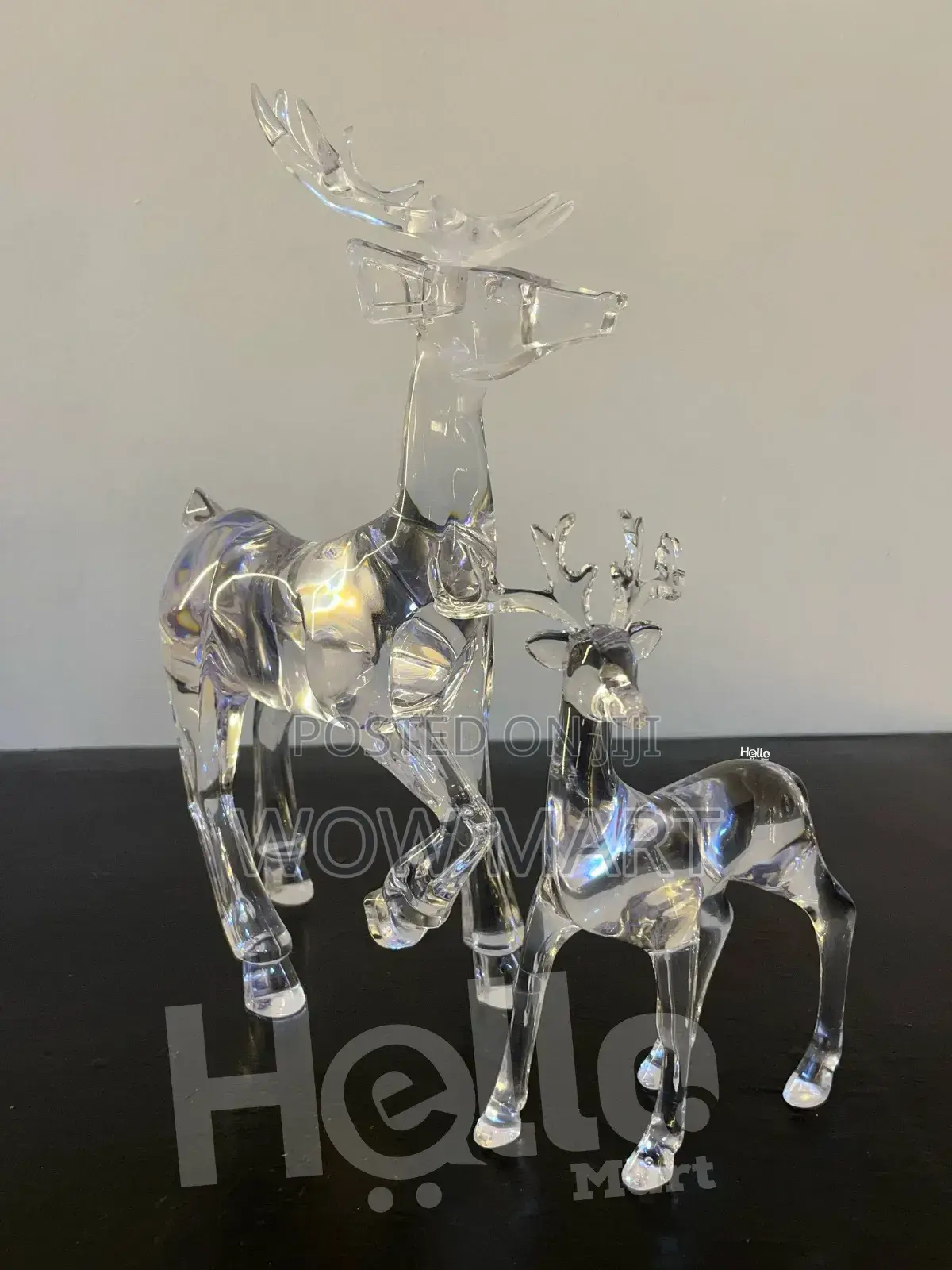 Two Clear Acrylic Reindeer Figurines.