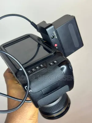 Black Magic Cinematic Camera .10-22mm Lens 3 Batteries Charger