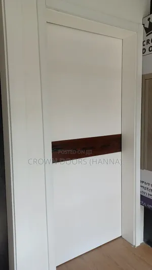 ክራዉን ትልቁ በር ማምረቻ ኩባንያ ከእንጨት ፋይበር,ከተፈጥሮ ድንጋይ የተሰሩ 100% Water Proof Door