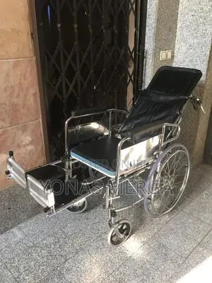 Reclining Wheelchair夢添locking Rear Wheels Provide Safety Stability.