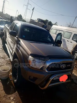Toyota Tacoma 2dr Regular Cab 4WD 6.1 ft. SB (2.7L 4cyl 4A) 2014 Brown