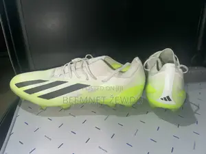 Football Boots ታኬታ