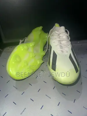 Football Boots ታኬታ