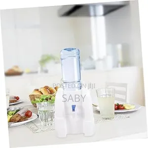 Universal Water Bottle/Jar Holder And Dispenser