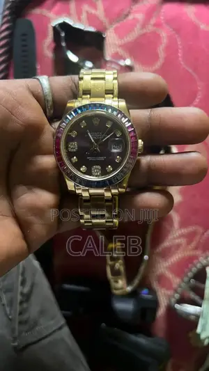 Rolex Oyster Perpetual Datejust – Rainbow Bezel (Gold-Tone)