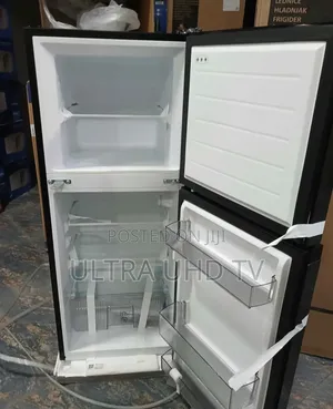 Midea Top-Mount Refrigerator, Likely Model 187l or Similar, in Black.
