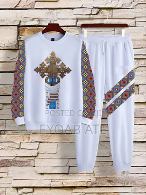 የጥምቀት ሹራብ እና ቱታ