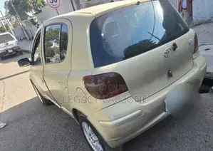 Toyota Vitz 2002 Yellow