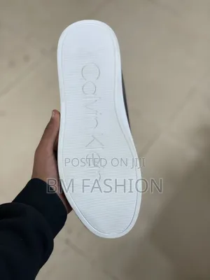 Calvin Klein 100% Original Flat Shoes (Free Delivery )