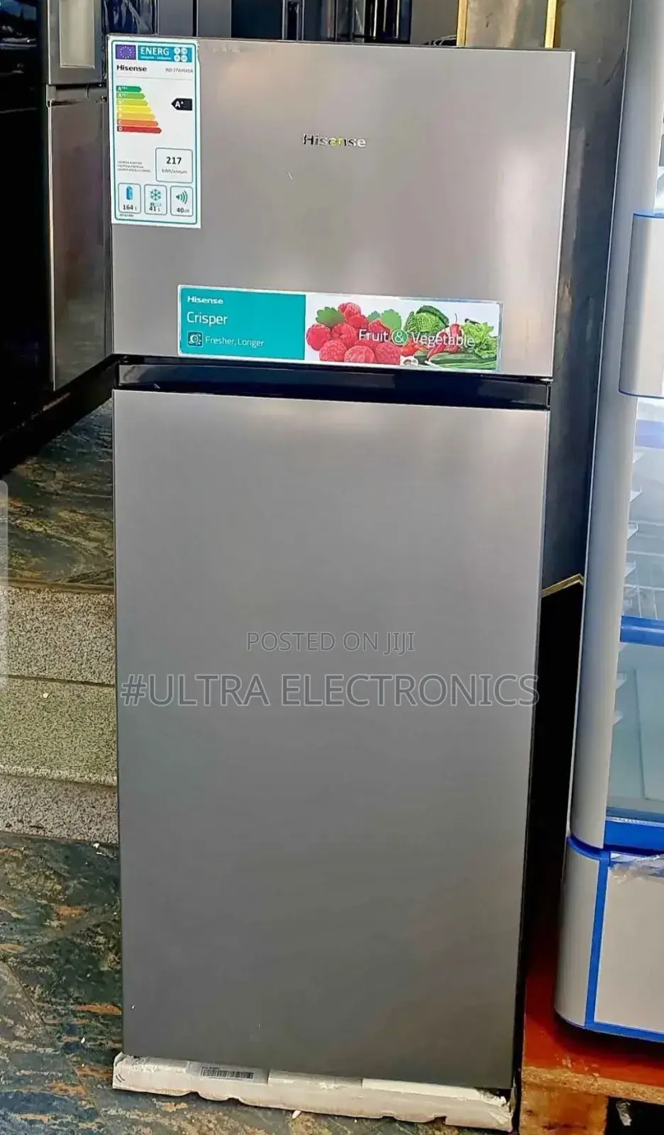 Hisense Top-Freezer Refrigerator. It Has a Total Capacity 270