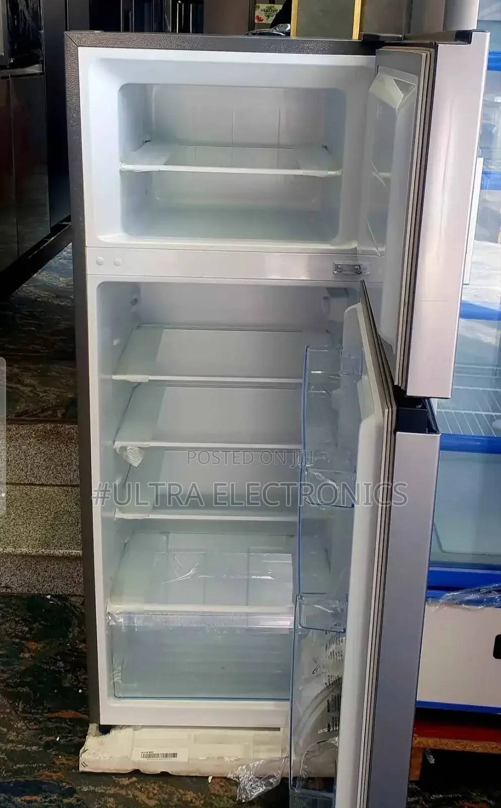 Hisense Top-Freezer Refrigerator. It Has a Total Capacity 270