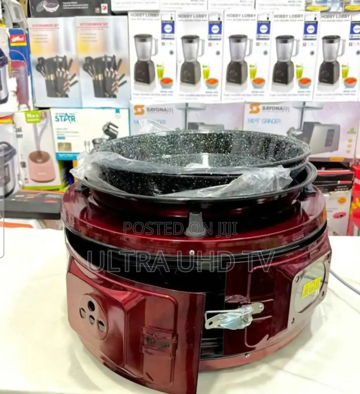 Red Electric Round Oven, Also Known as a Turkish or Arabic Bread