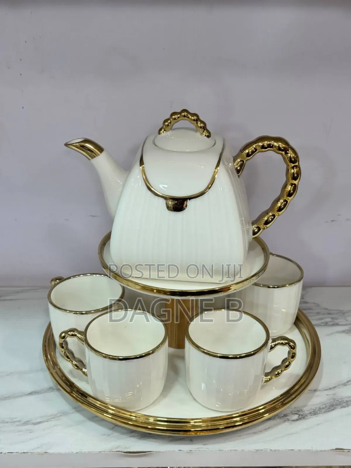 Porcelain Tea Set የወተት እና ቡና መጠጫ ሴት ከነ ማቅረቢያ