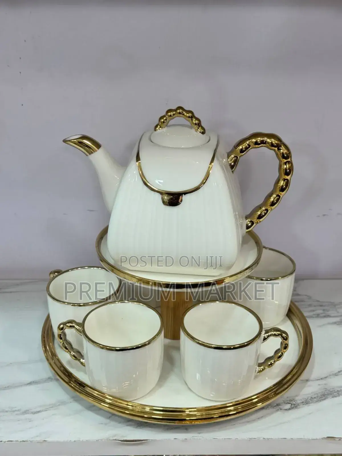 Porcelain Tea Set የወተት እና ቡና መጠጫ ሴት ከነ ማቅረቢያ