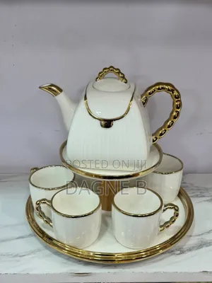 Porcelain Tea Set የወተት እና ቡና መጠጫ ሴት ከነ ማቅረቢያ